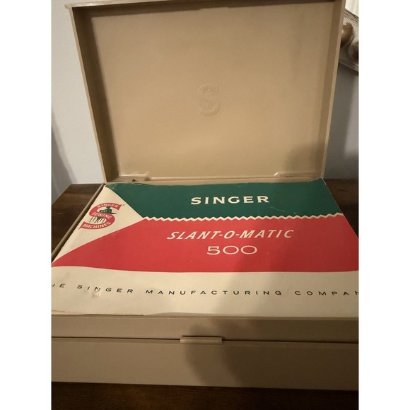 Vintage accessory kit for the Singer 500 / 500A Slant-O-Matic sewing machine.